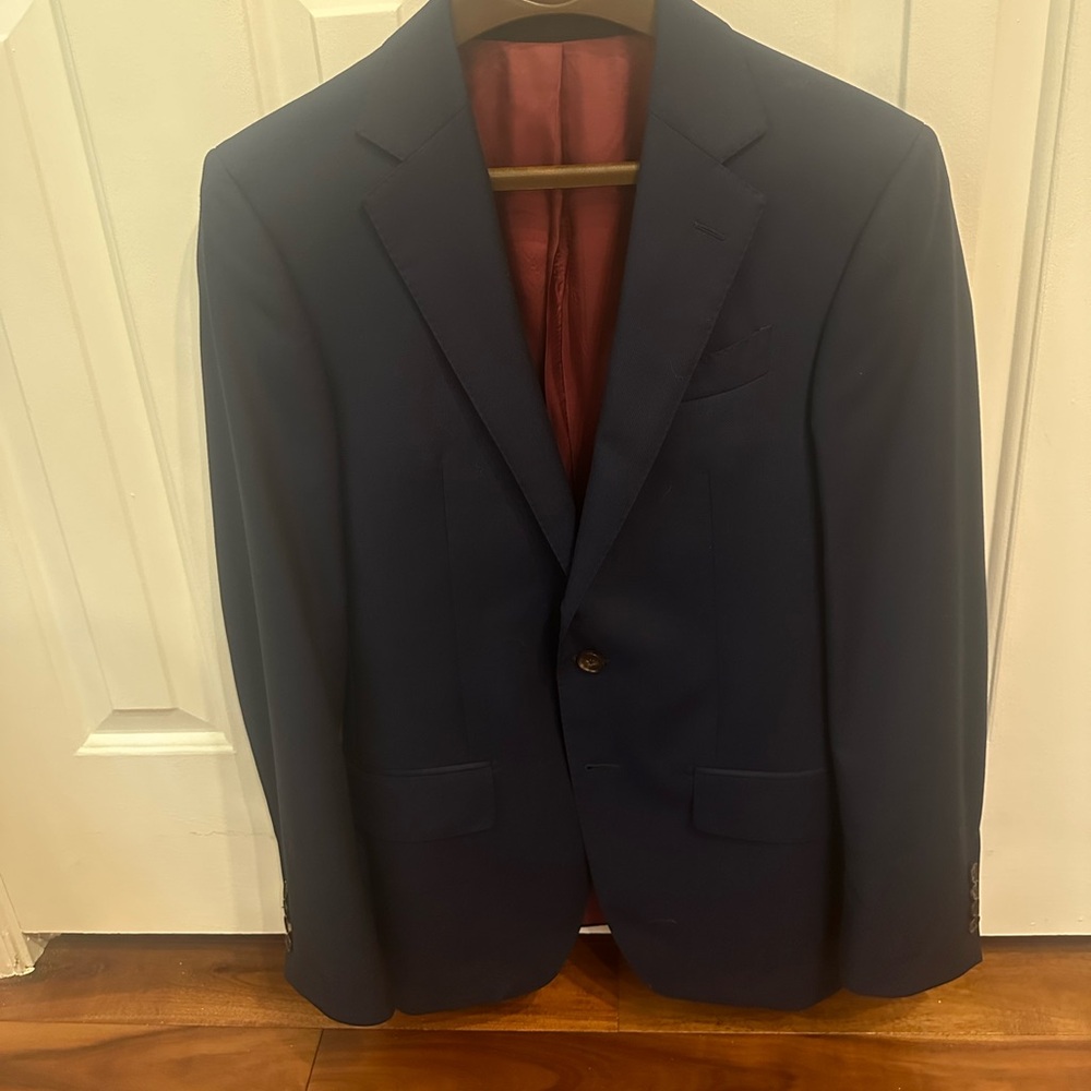 Spear and McKay Core line blue suit in a 34R. Pants are a 28x28